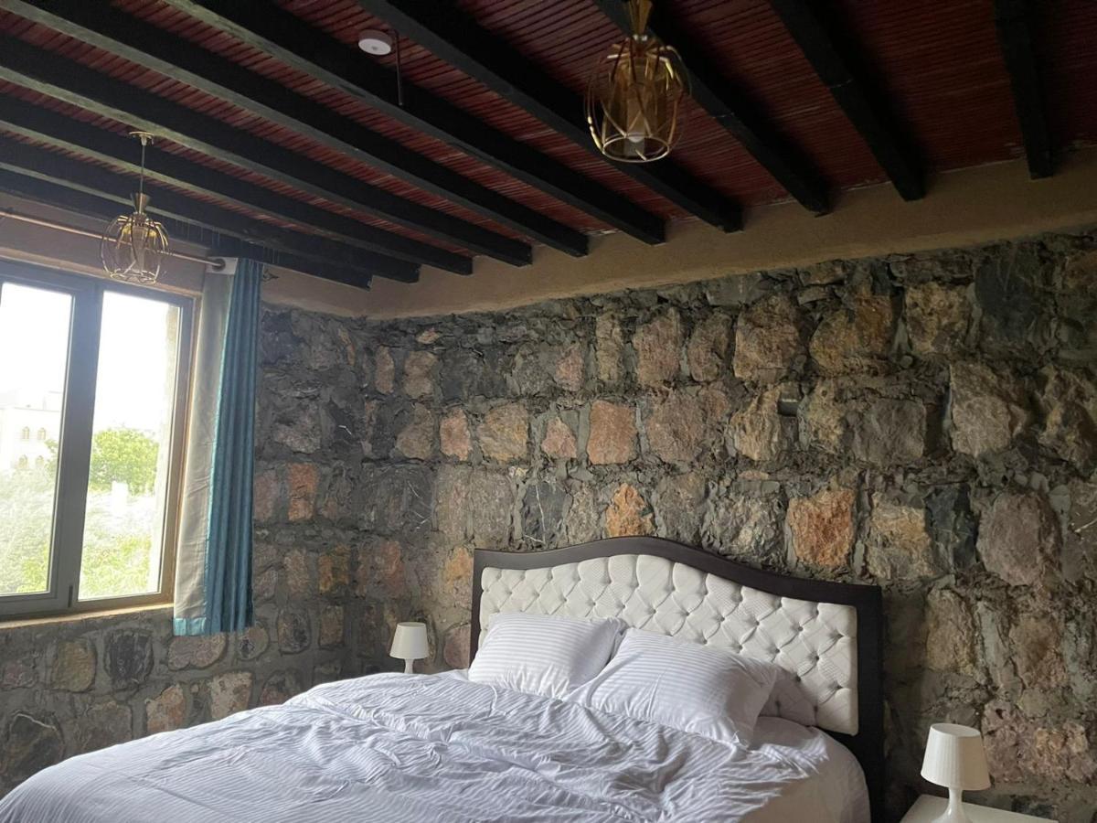Rose Guesthouse Al 'Aqar Exterior photo